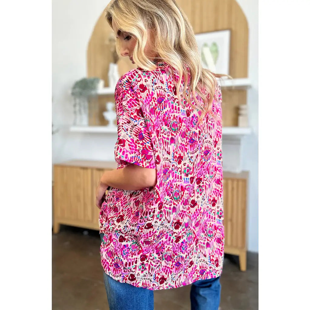 Stay stylish at work and beyond with the Abstractly Mine Printed V-Neck Short Sleeve Blouse. Lightweight breathable