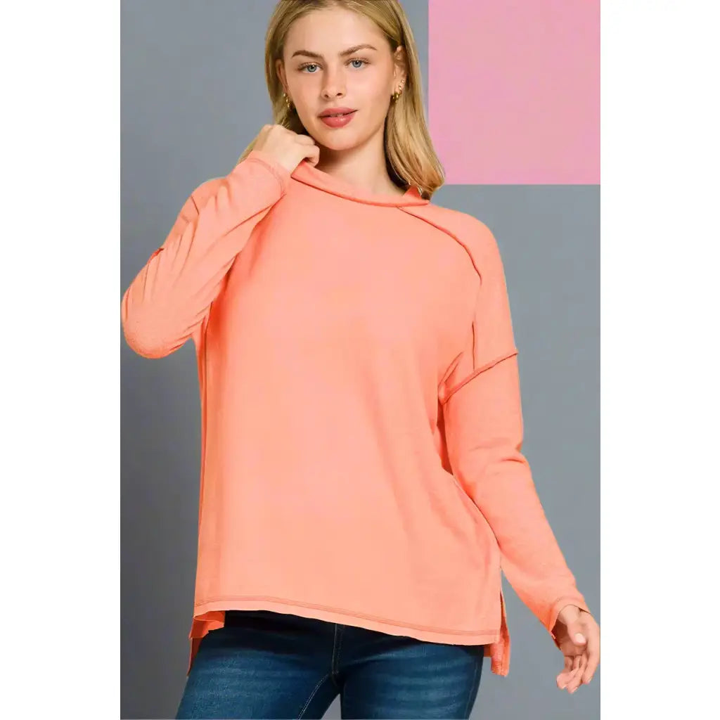 Autumn Glow high-low long sleeve tee in soft melange hacci. Plus size friendly cozy and casual chic with exposed seams.