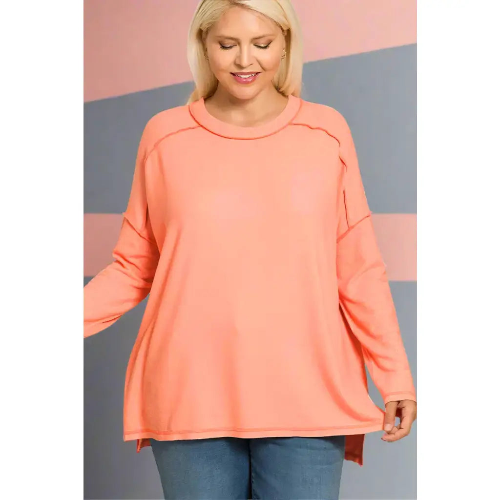 Autumn Glow high-low long sleeve tee in soft melange hacci. Plus size friendly cozy and casual chic with exposed seams.