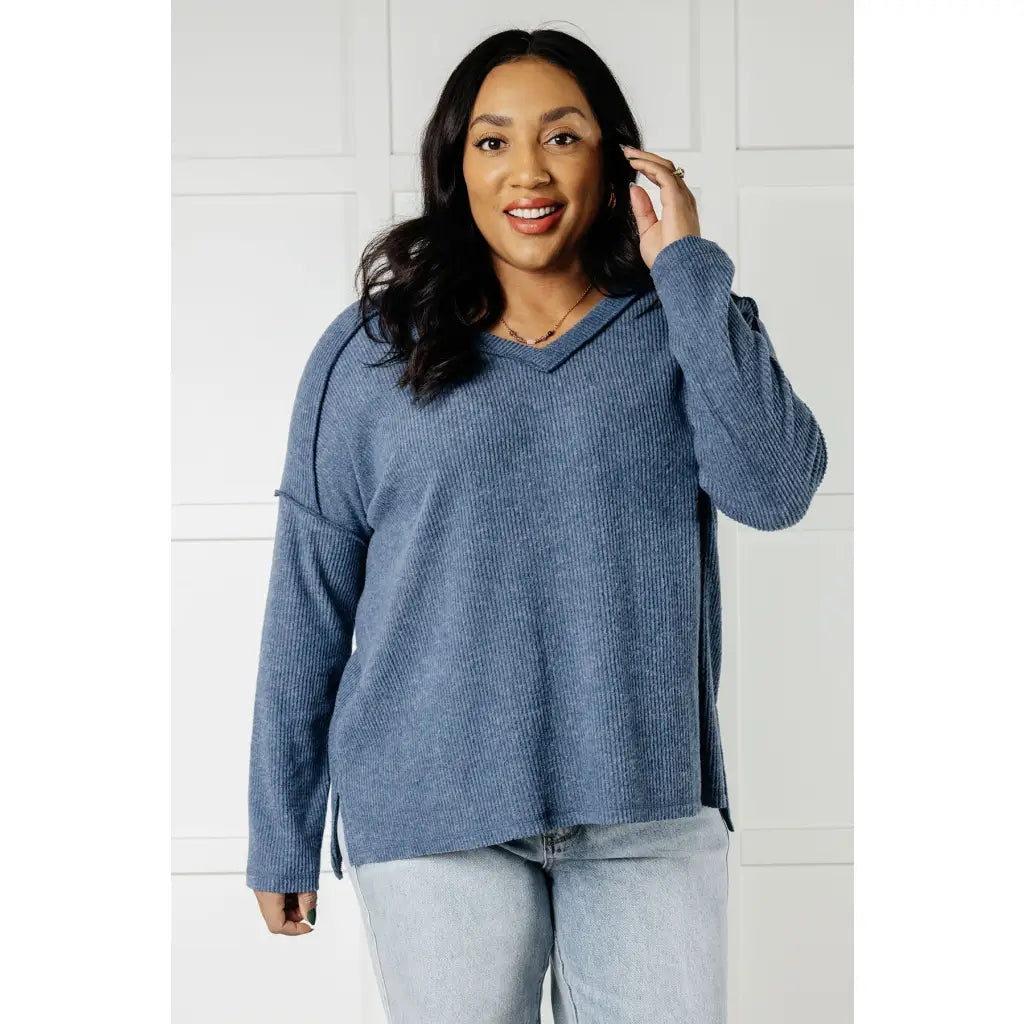 Get ready to cuddle up in our Basically Freezing V-Neck Top Dusty Blue! Its soft brushed hacci fabric and stretchy