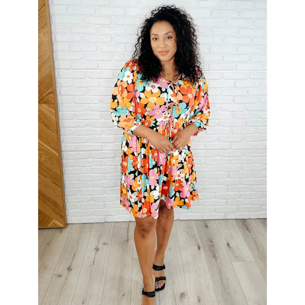 Make a statement in the Bow dly Go V Neck Floral Mini Dress. A bold playful vibrant boutique dress buttery soft fabric