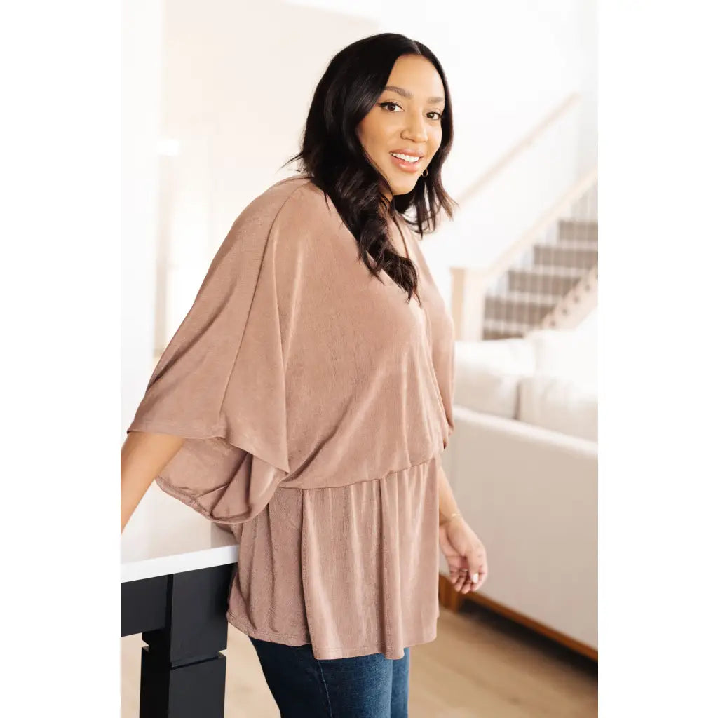 Meet our Bronzed Daze Draped V Neck Blouse! This gorgeous top is constructed from a slinky and shimmering bronze ribbed