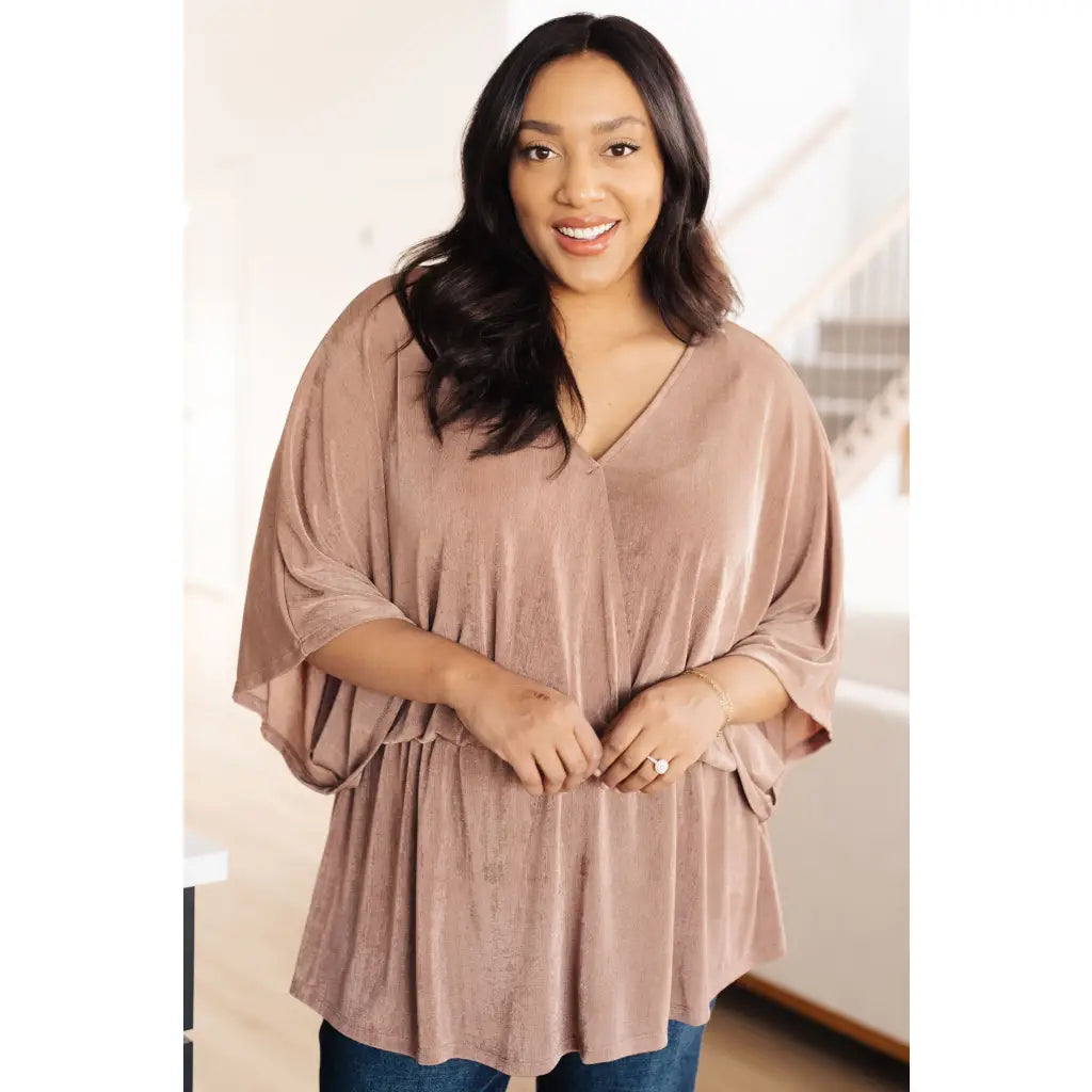Meet our Bronzed Daze Draped V-Neck Blouse! This gorgeous top is constructed from a slinky and shimmering bronze ribbed