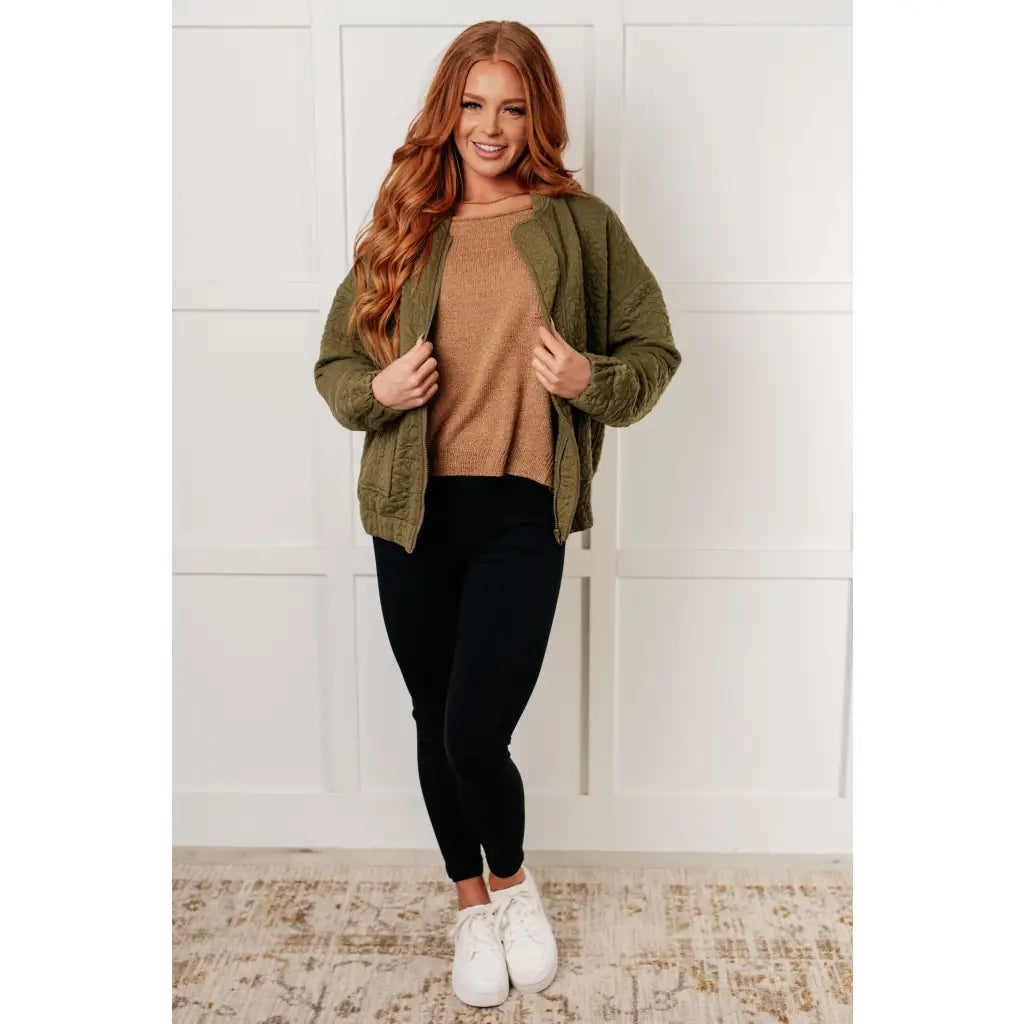 Our Caramel Feelings Boatneck Sweater features a wide boat neckline and dropped shoulder chest pocket that gives