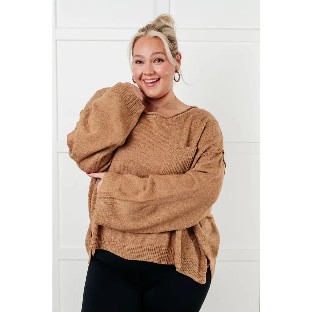 Our Caramel Feelings Boatneck Sweater features a wide boat neckline and dropped shoulder chest pocket that gives
