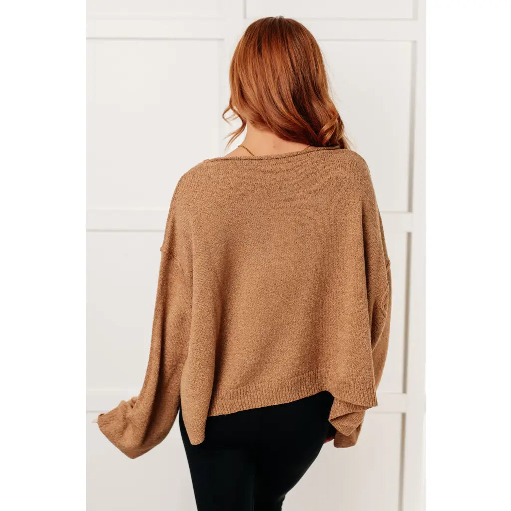 Our Caramel Feelings Boatneck Sweater features a wide boat neckline and dropped shoulder chest pocket that gives
