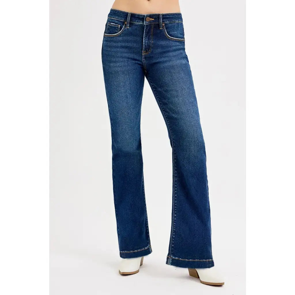 Flattering tummy control mid rise flare jeans by RISEN. Slight stretch leg-lengthening silhouette plus size friendly.