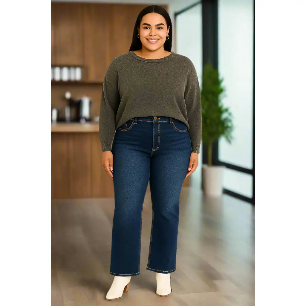 Flattering tummy control mid rise flare jeans by RISEN. Slight stretch leg-lengthening silhouette plus size friendly.