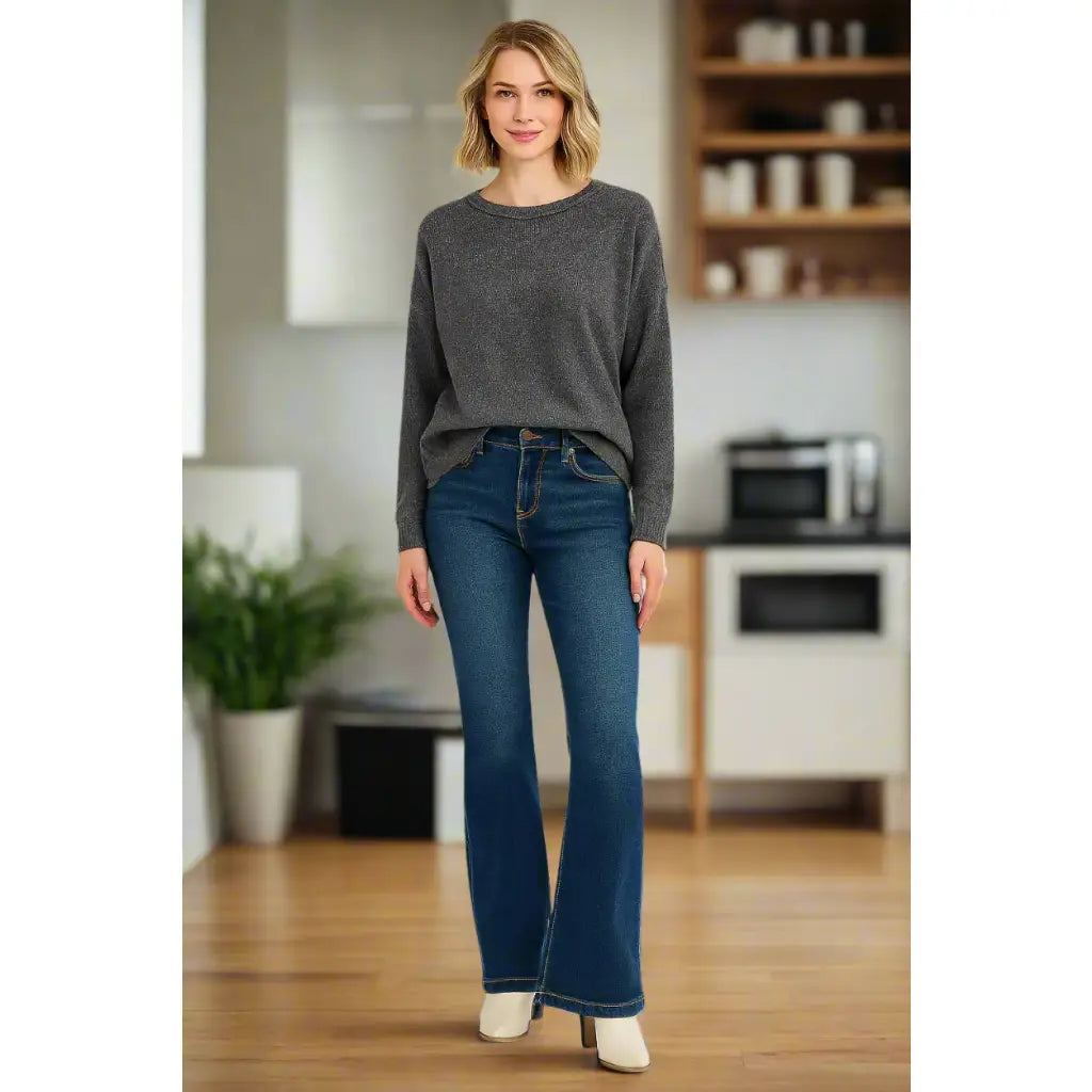 Flattering tummy control mid rise flare jeans by RISEN. Slight stretch leg-lengthening silhouette plus size friendly.