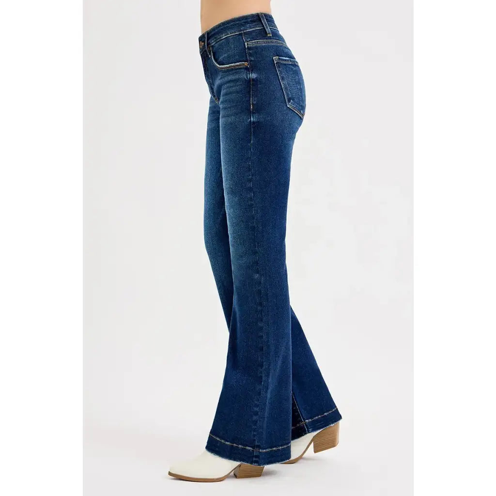 Flattering tummy control mid rise flare jeans by RISEN. Slight stretch leg-lengthening silhouette plus size friendly.