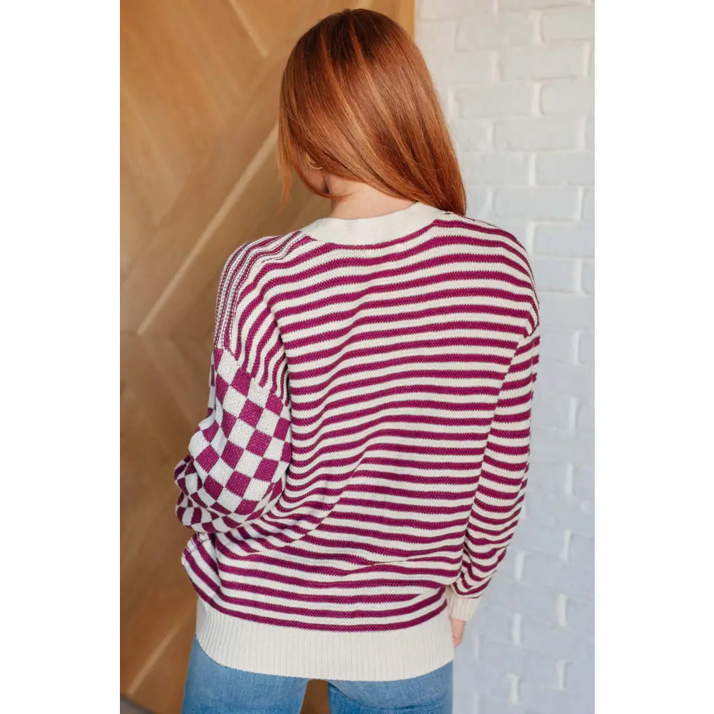 Stay cozy and stylish in our Check the Stripes Knit Cardigan Magenta Oatmeal is a versatile piece features flattering