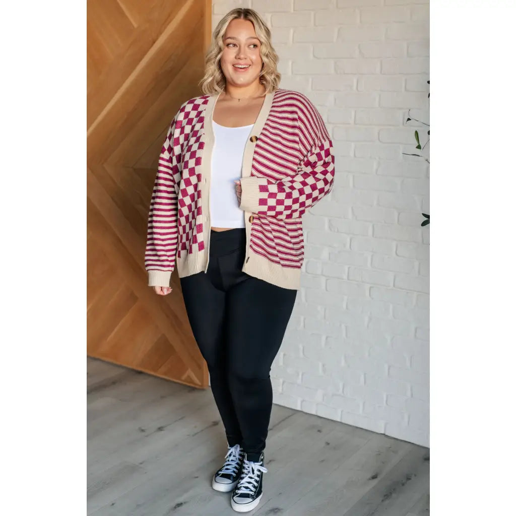 Stay cozy and stylish in our Check the Stripes Knit Cardigan Magenta Oatmeal is a versatile piece features flattering