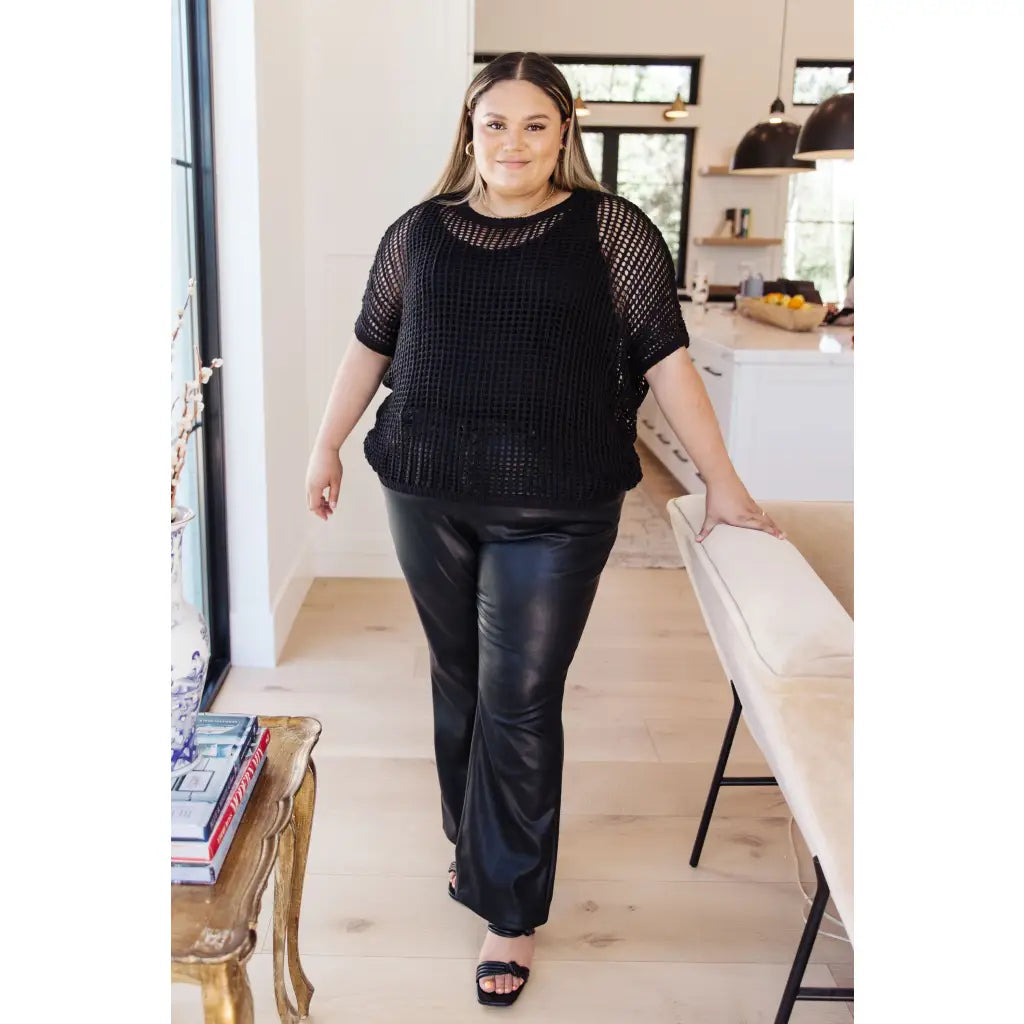 Look effortlessly stylish this season in the Coastal Dreams Fishnet Top! Crafted from a soft fishnet sweater open knit