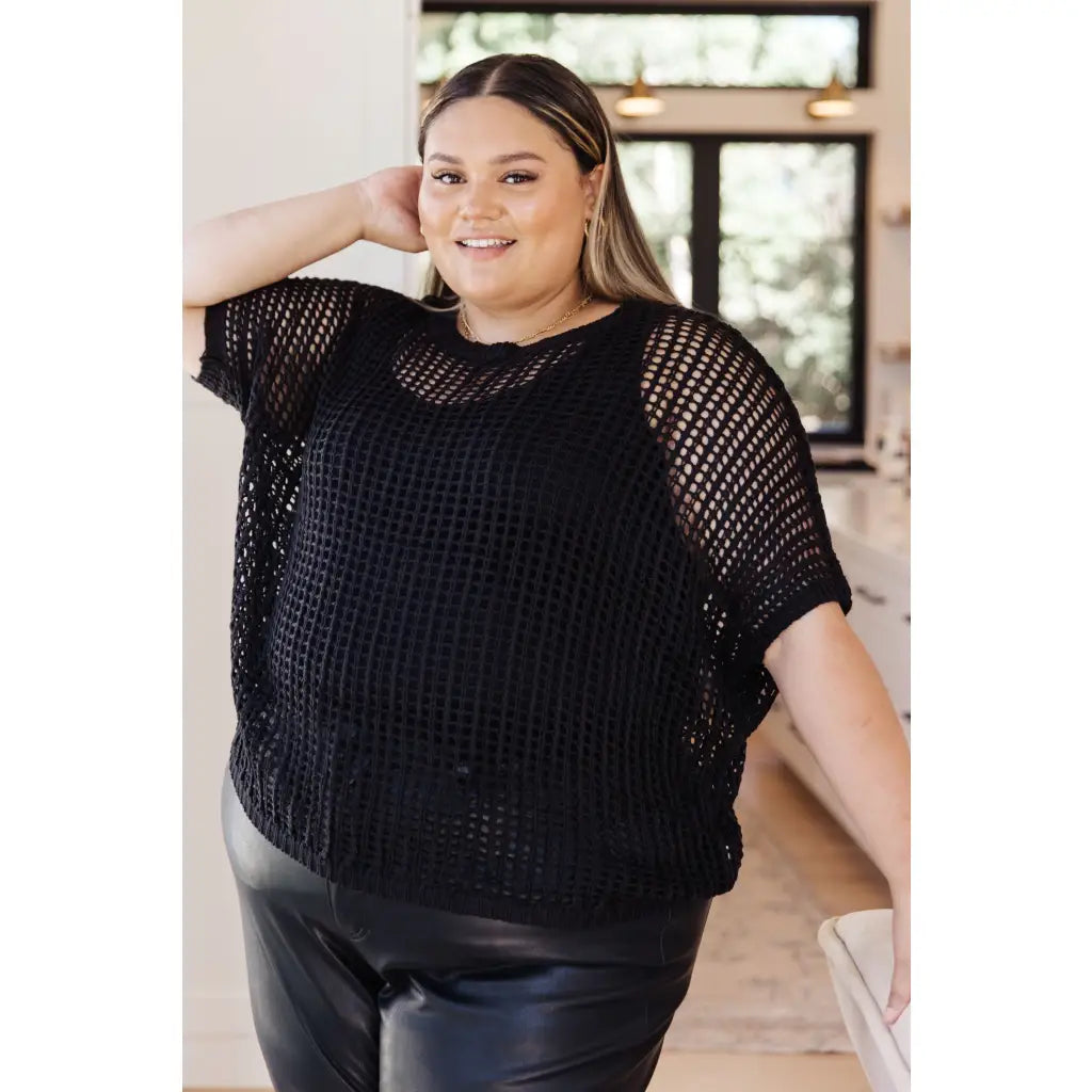 Look effortlessly stylish this season in the Coastal Dreams Fishnet Top! Crafted from a soft fishnet sweater open knit
