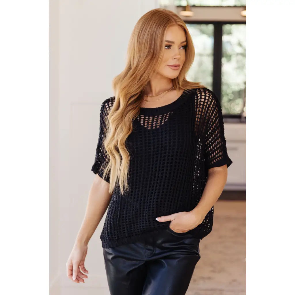 Look effortlessly stylish this season in the Coastal Dreams Fishnet Top! Crafted from a soft fishnet sweater open knit