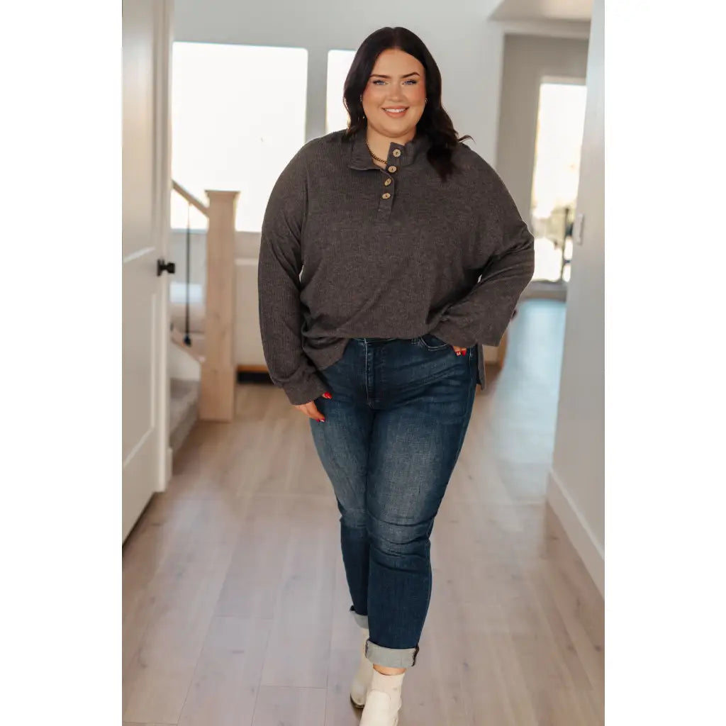 The Cozy All Over Henley Top in Cocoa is soft stylish and chic featuring a brushed ribbed knit mock neckline relaxed