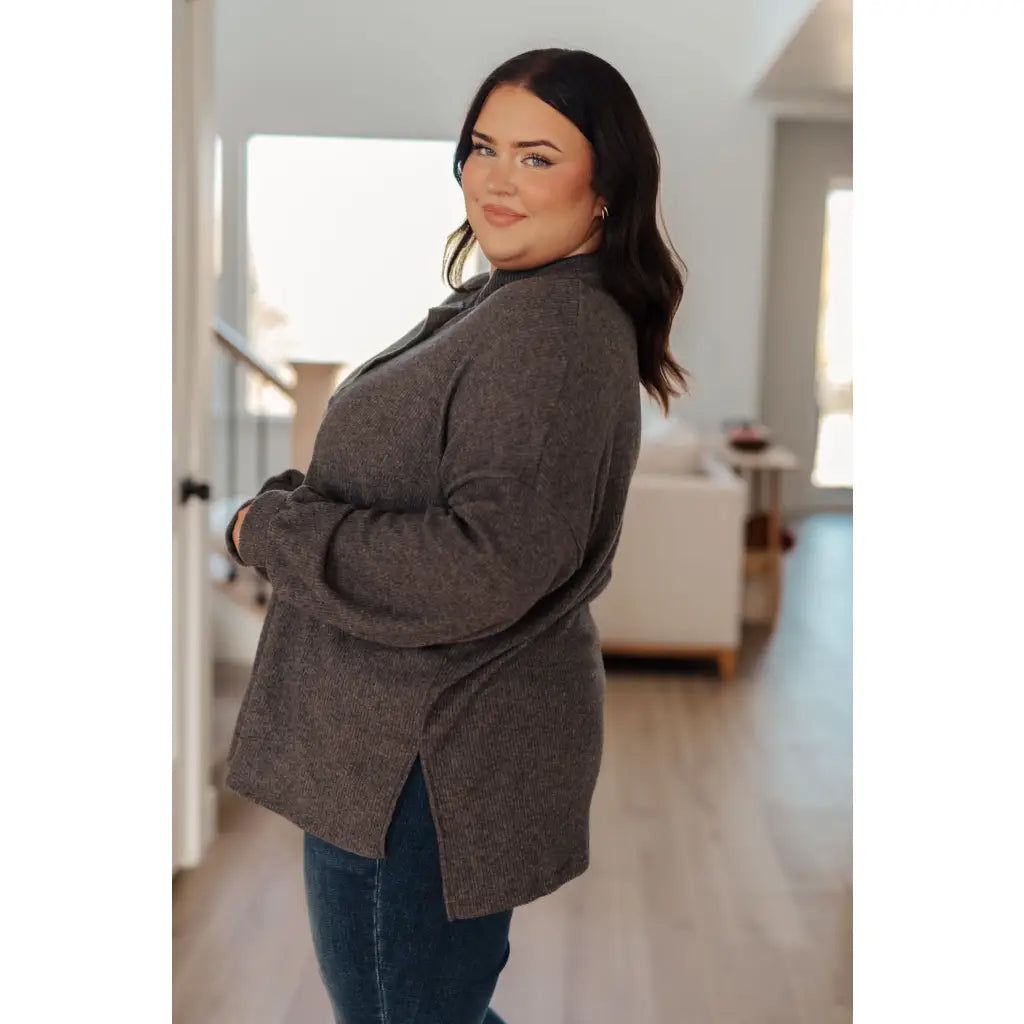 The Cozy All Over Henley Top in Cocoa is soft stylish and chic featuring a brushed ribbed knit mock neckline relaxed