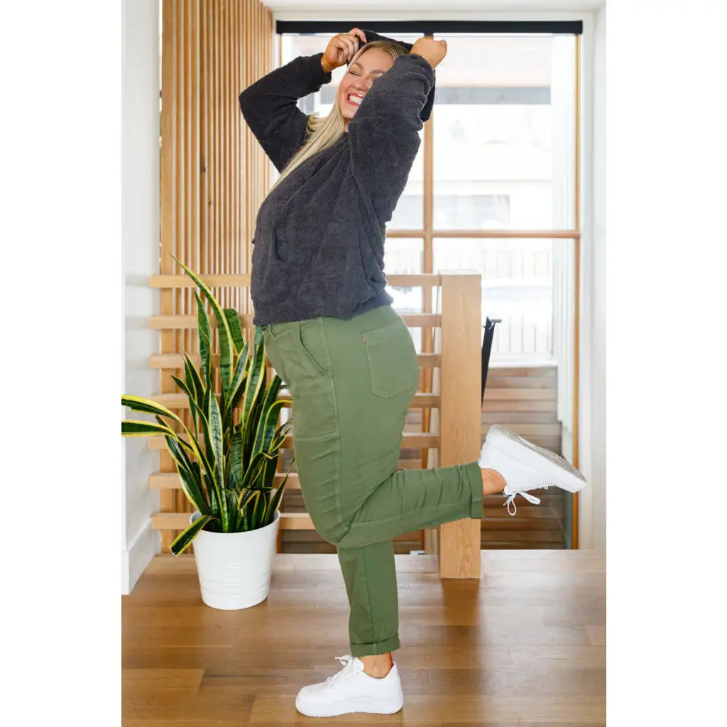 Our Cozy Does It Hoodie In Charcoal is so comfy! The coziness starts with a fuzzy medium weight knit that shapes slight