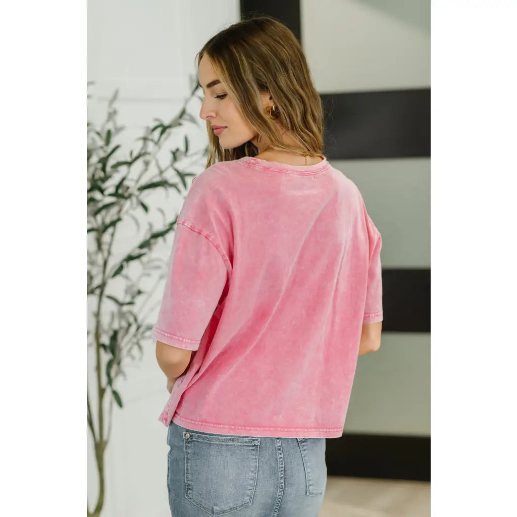 Soft pink crochet pocket tee with drop shoulder and stretch jersey comfort. Cozy cute plus size friendly for everyday