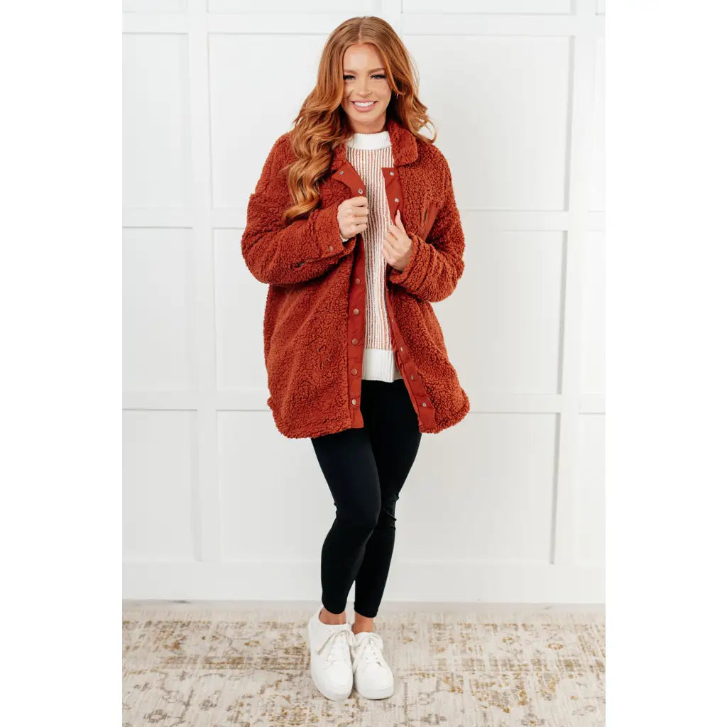 Our Cozy Oversized Contrast Trim Sweater in Mocha and White features a textured knit banded ribbed details on the round