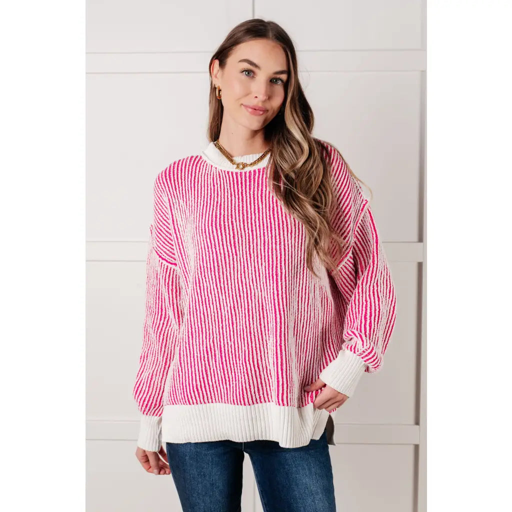 Our Cozy Oversized Contrast Trim Sweater in Pink and White features a textured knit banded ribbed details on the round