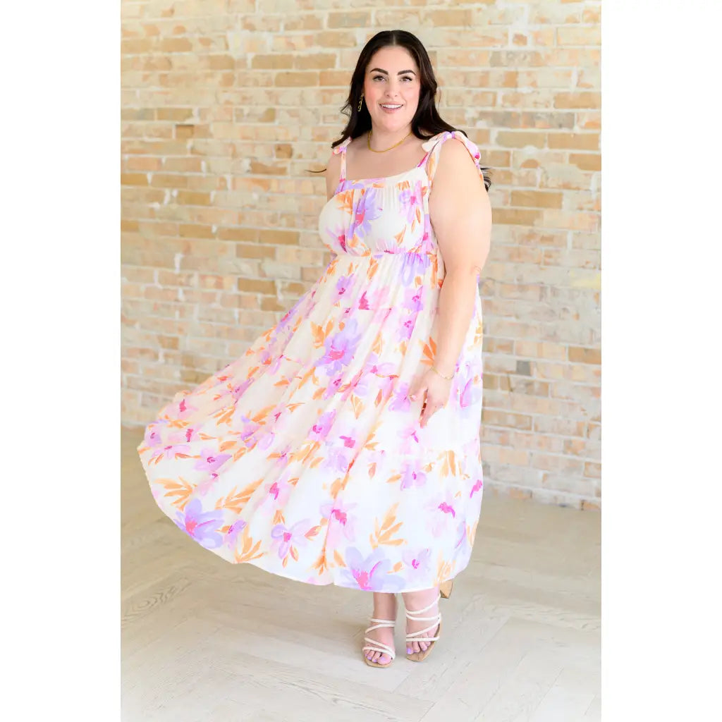 Turn heads in this dreamy floral print midi dress—adjustable straps flattering fit plus size friendly. A boutique