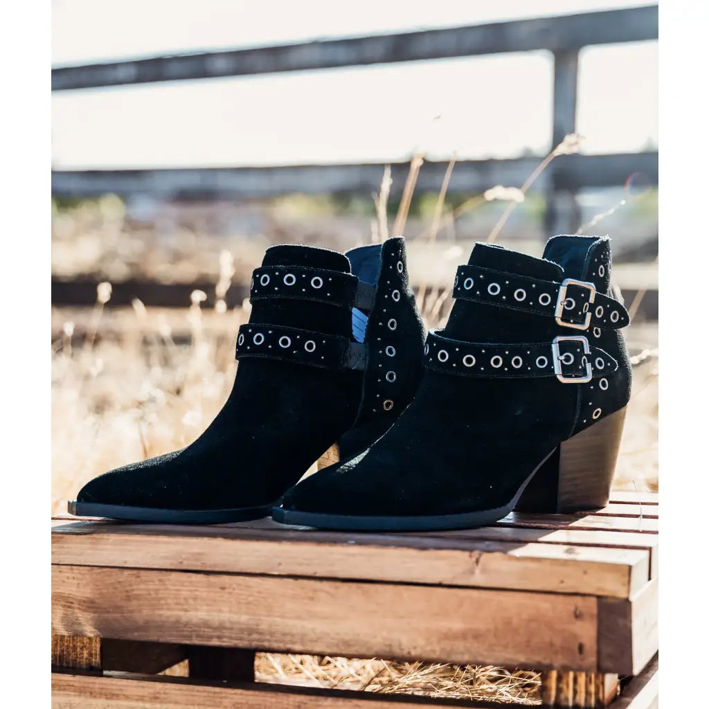 Step into timeless style with the Elsa Leather Ankle Boot in Black! Genuine suede stylish hardware and cushioned