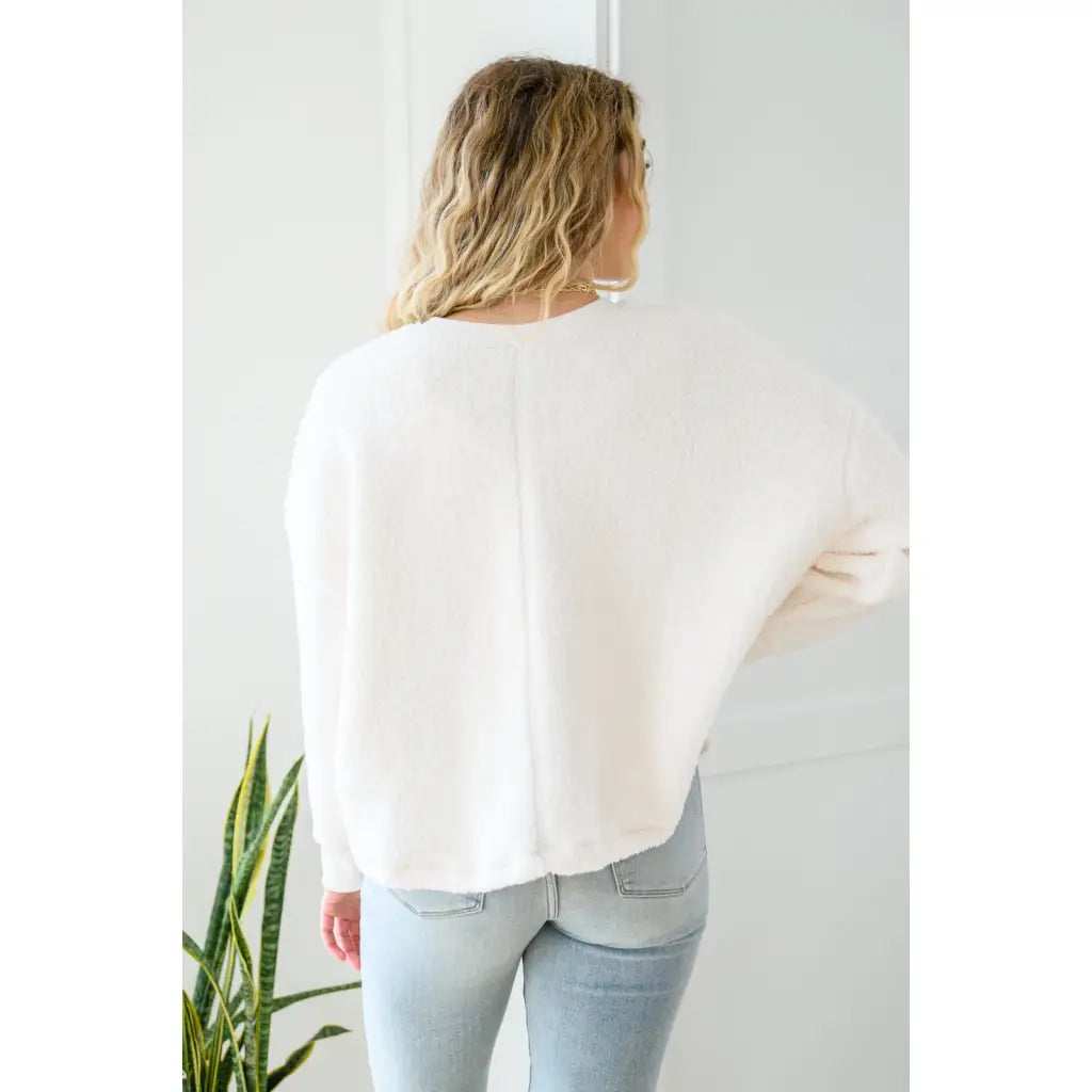 Those chilly days aren’t going anywhere anytime soon so make sure to stay cozy in our Fuzzy Cuddles Off White Sweater!