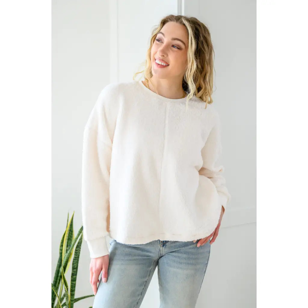 Those chilly days aren’t going anywhere anytime soon so make sure to stay cozy in our Fuzzy Cuddles Off White Sweater!
