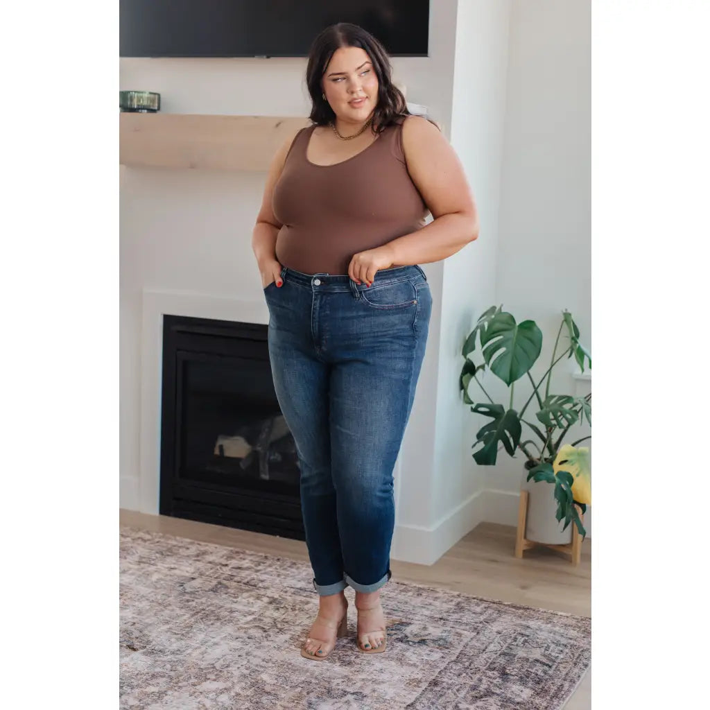 Dark wash Judy Blue slim fit jeans with 4-way stretch mid-rise and optional cuff. Size inclusive from 0–24W