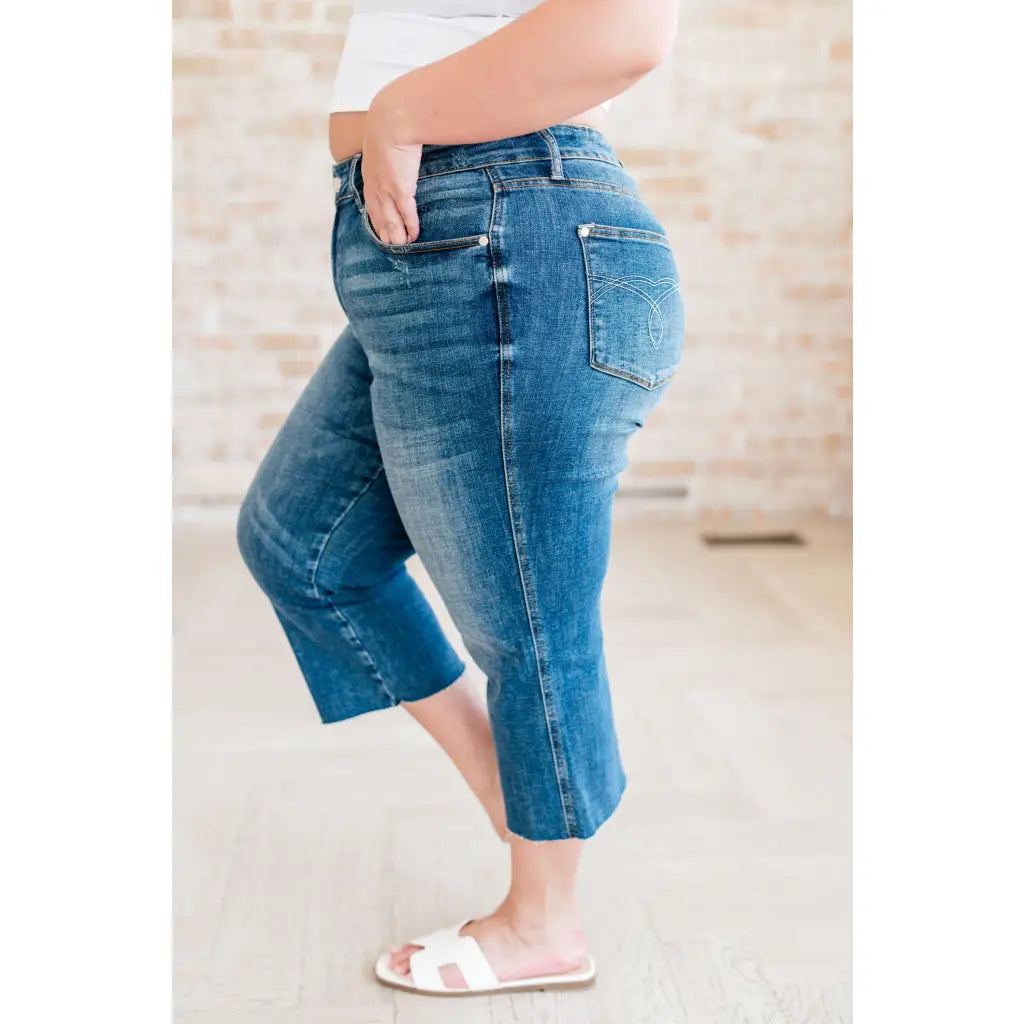 Discover effortless style with our Hayes High Rise Wide Leg Crop Jeans. This medium wash 4 way stretch denim is cut