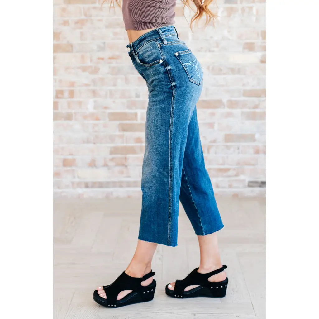 Discover effortless style with our Hayes High Rise Wide Leg Crop Jeans. This medium wash 4 way stretch denim is cut