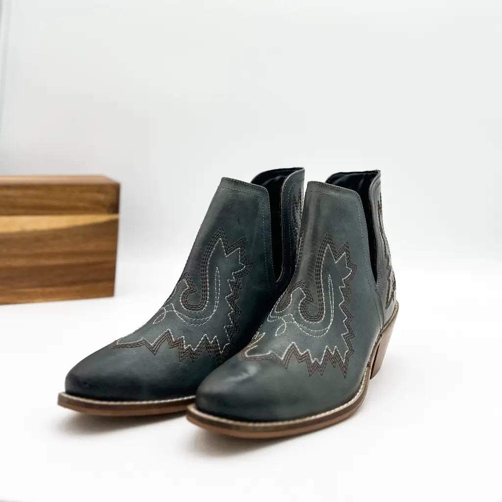 Our Kickin’ Booties in Dark Teal are perfection! From the genuine leather construction with intricate western inspired