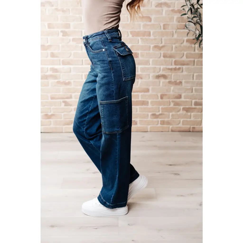 Our Leila Cargo Judy Blue Jeans feature a trendy high rise fit versatile straight cut and cargo pockets. The 4 way