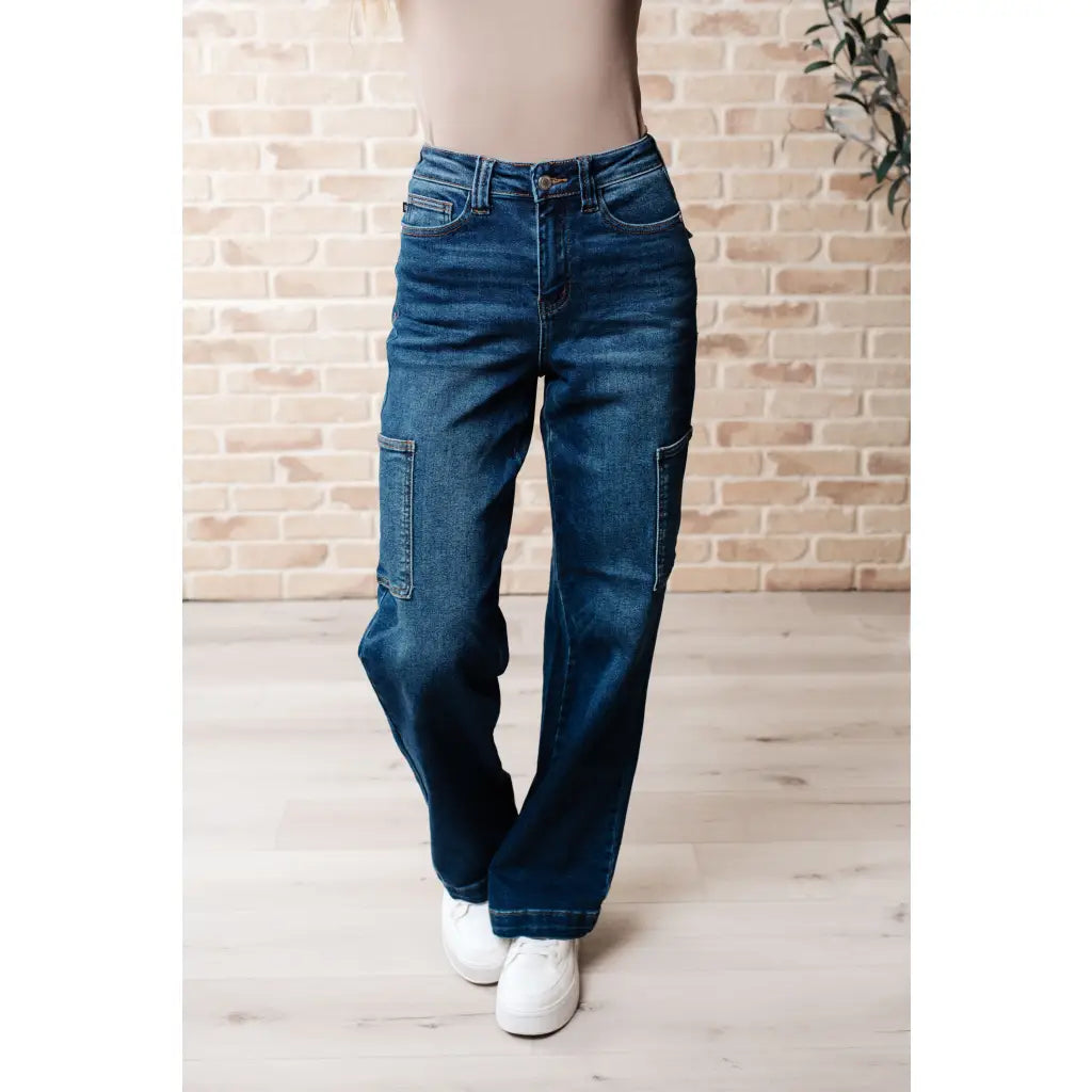 Our Leila Cargo Judy Blue Jeans feature a trendy high rise fit versatile straight cut and cargo pockets. The 4 way