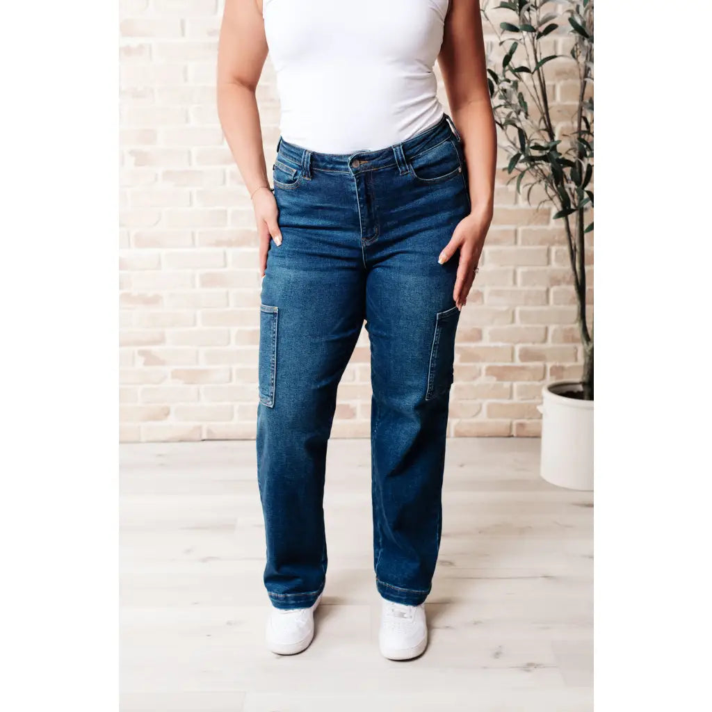 Our Leila Cargo Judy Blue Jeans feature a trendy high rise fit versatile straight cut and cargo pockets. The 4 way