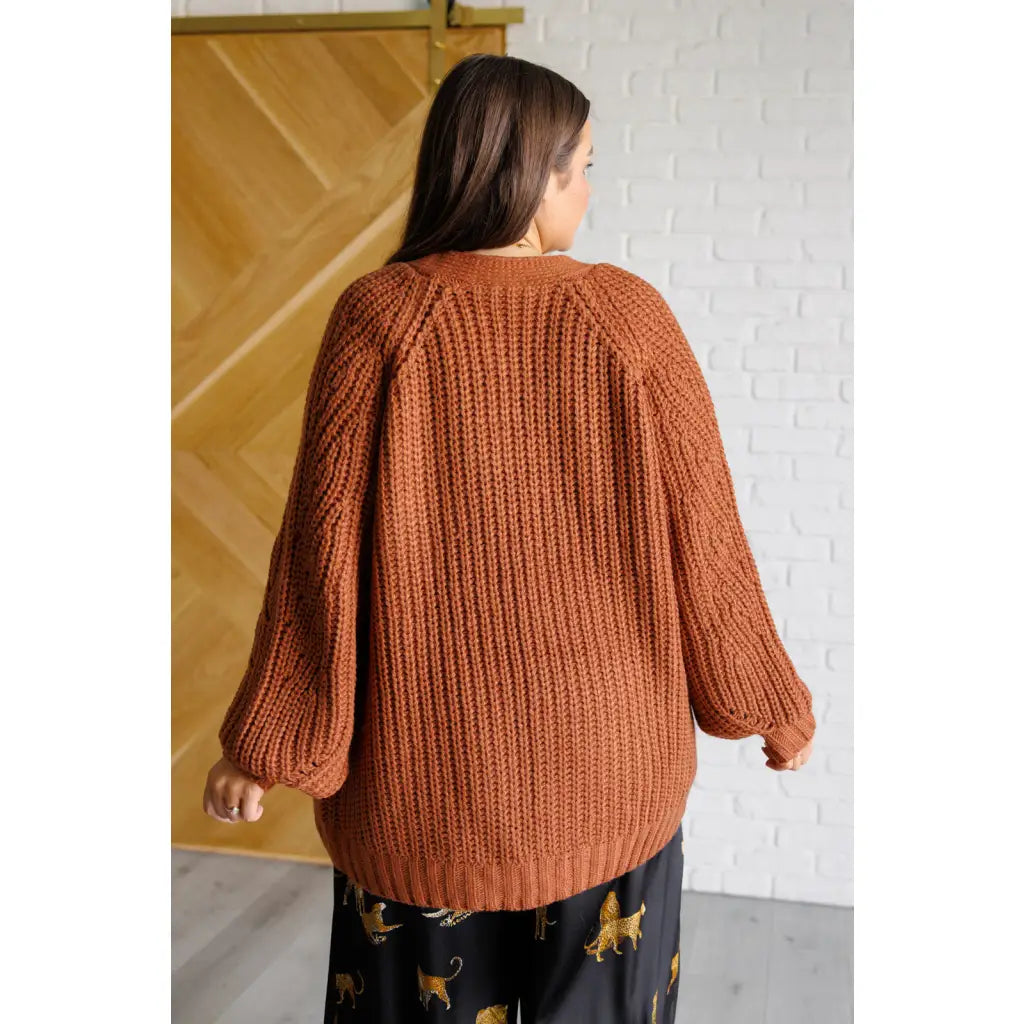 Stay cozy in our Maybe Monday Cardigan! This super soft sweater knit cardigan features an open front pockets a slouchy