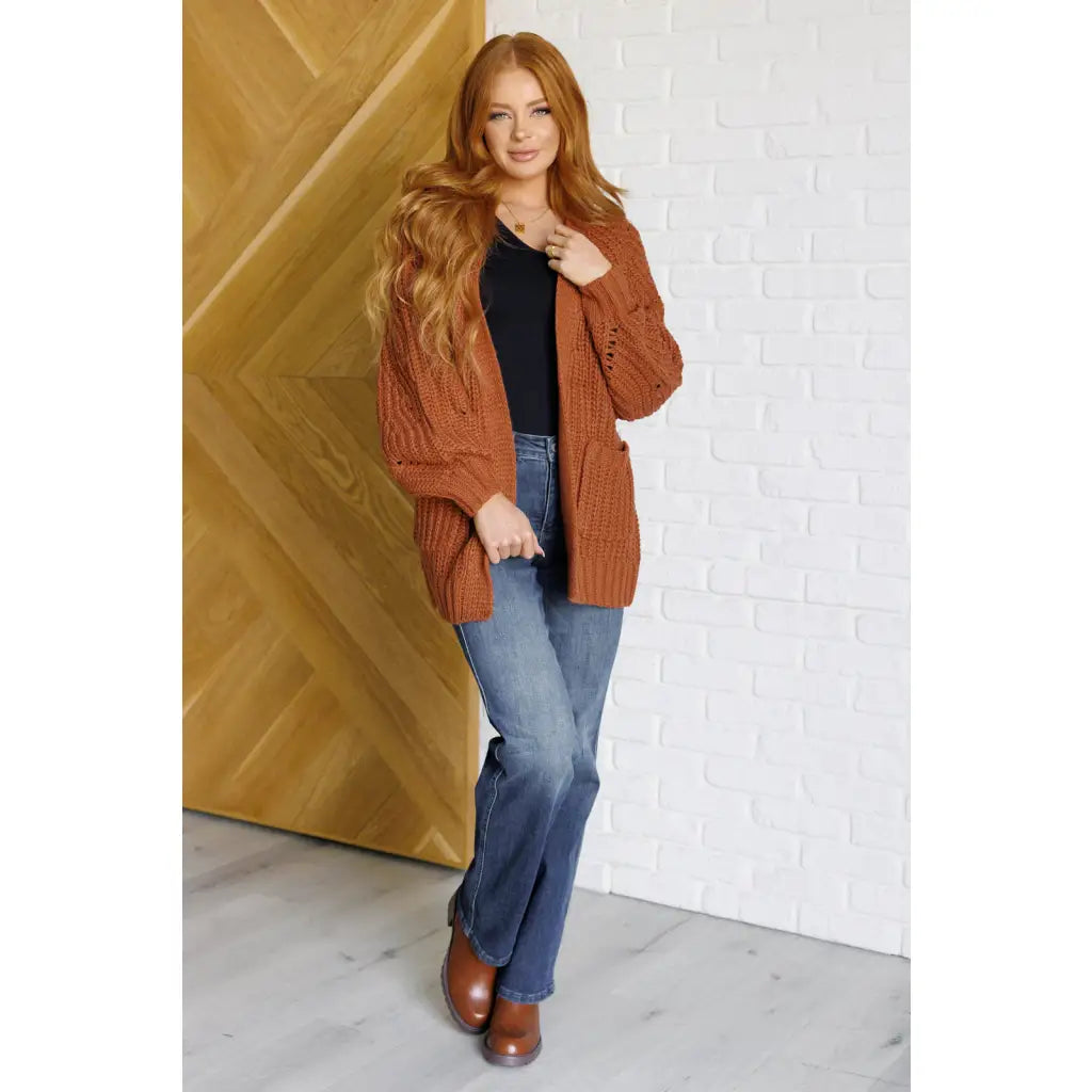 Stay cozy in our Maybe Monday Cardigan! This super soft sweater knit cardigan features an open front pockets a slouchy