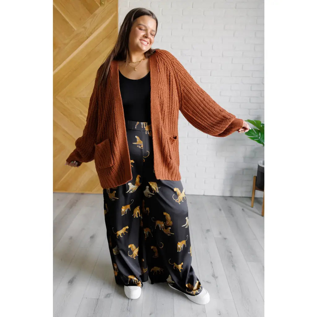 Stay cozy in our Maybe Monday Cardigan! This super soft sweater knit cardigan features an open front pockets a slouchy