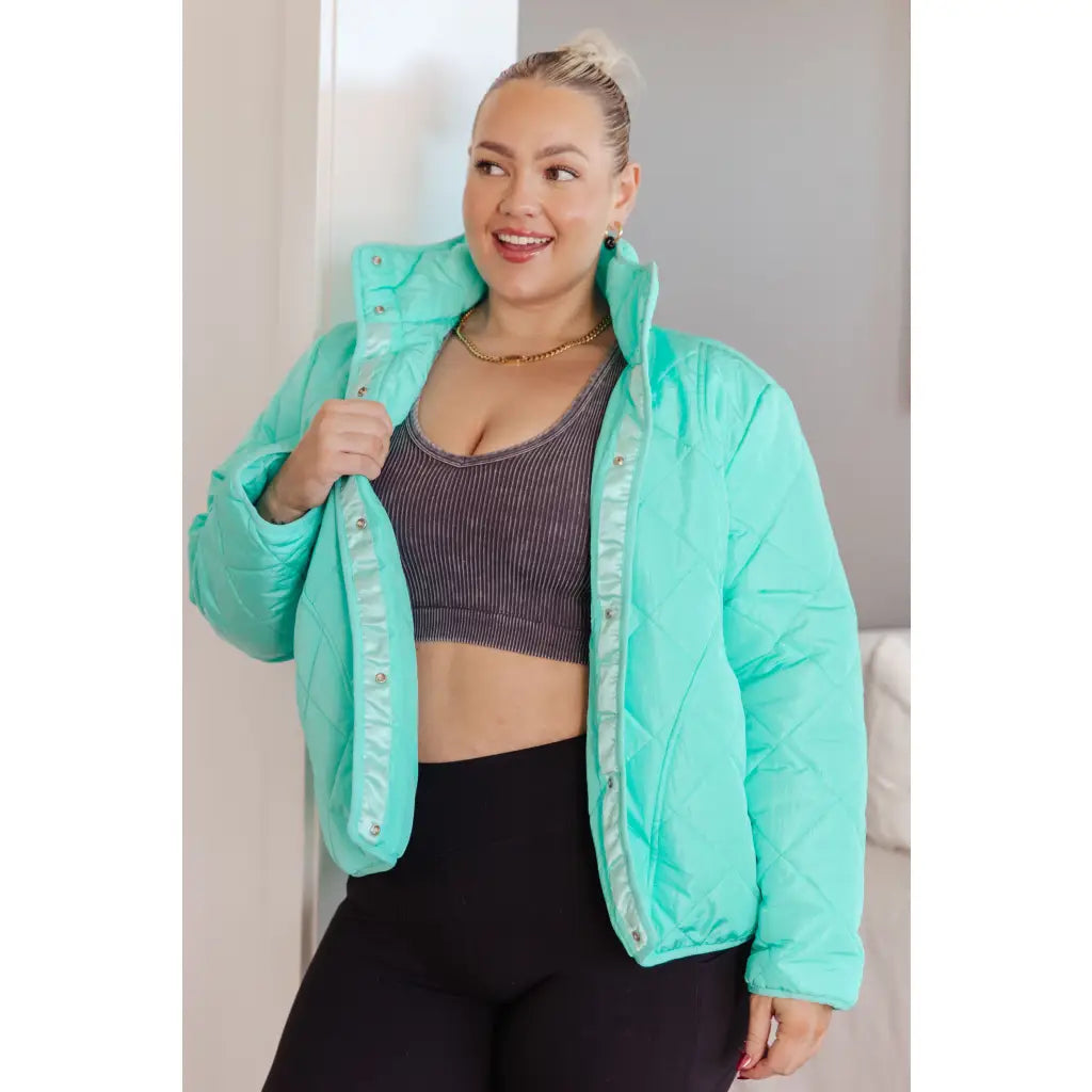Mint quilted puffer jacket with mock neck and snap front. Plus sizes available. Slightly oversized fit cozy boutique
