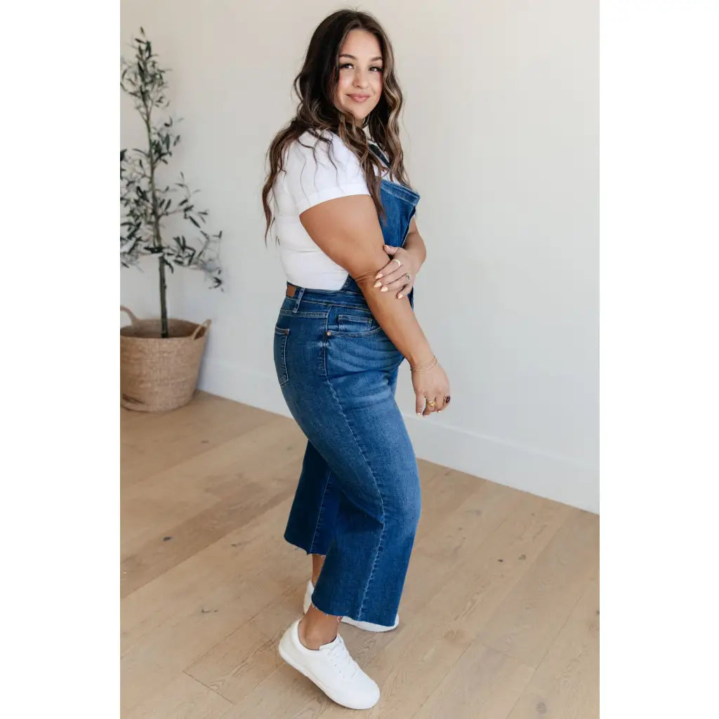 Step out in style with Priscilla High Rise Crop Wide Leg Denim Overalls from Judy Blue! These chic retro-style overalls