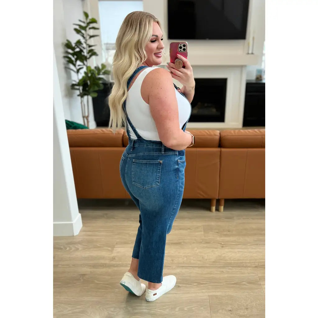 Step out in style with Priscilla High Rise Crop Wide Leg Denim Overalls from Judy Blue! These chic retro-style overalls