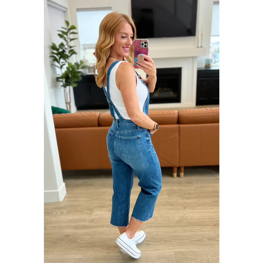 Step out in style with Priscilla High Rise Crop Wide Leg Denim Overalls from Judy Blue! These chic retro-style overalls