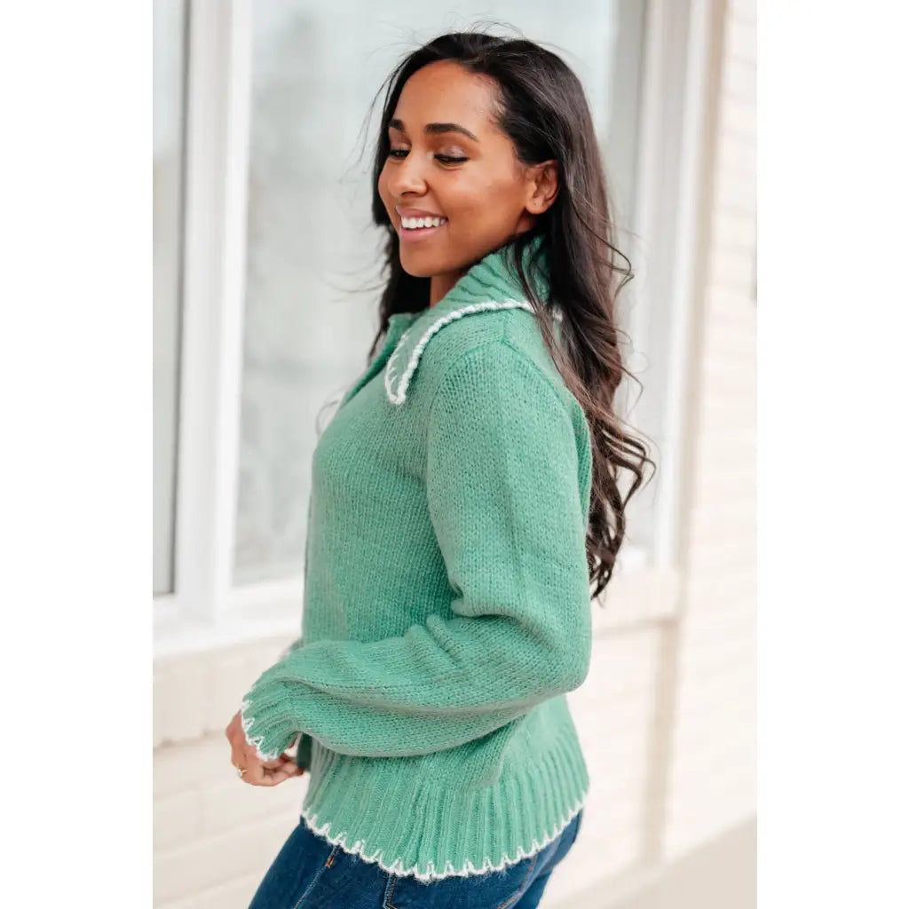 Our relaxed and cozy Ready for Surprises Cardigan features a soft green sweater knit exaggerated shawl collar contrast