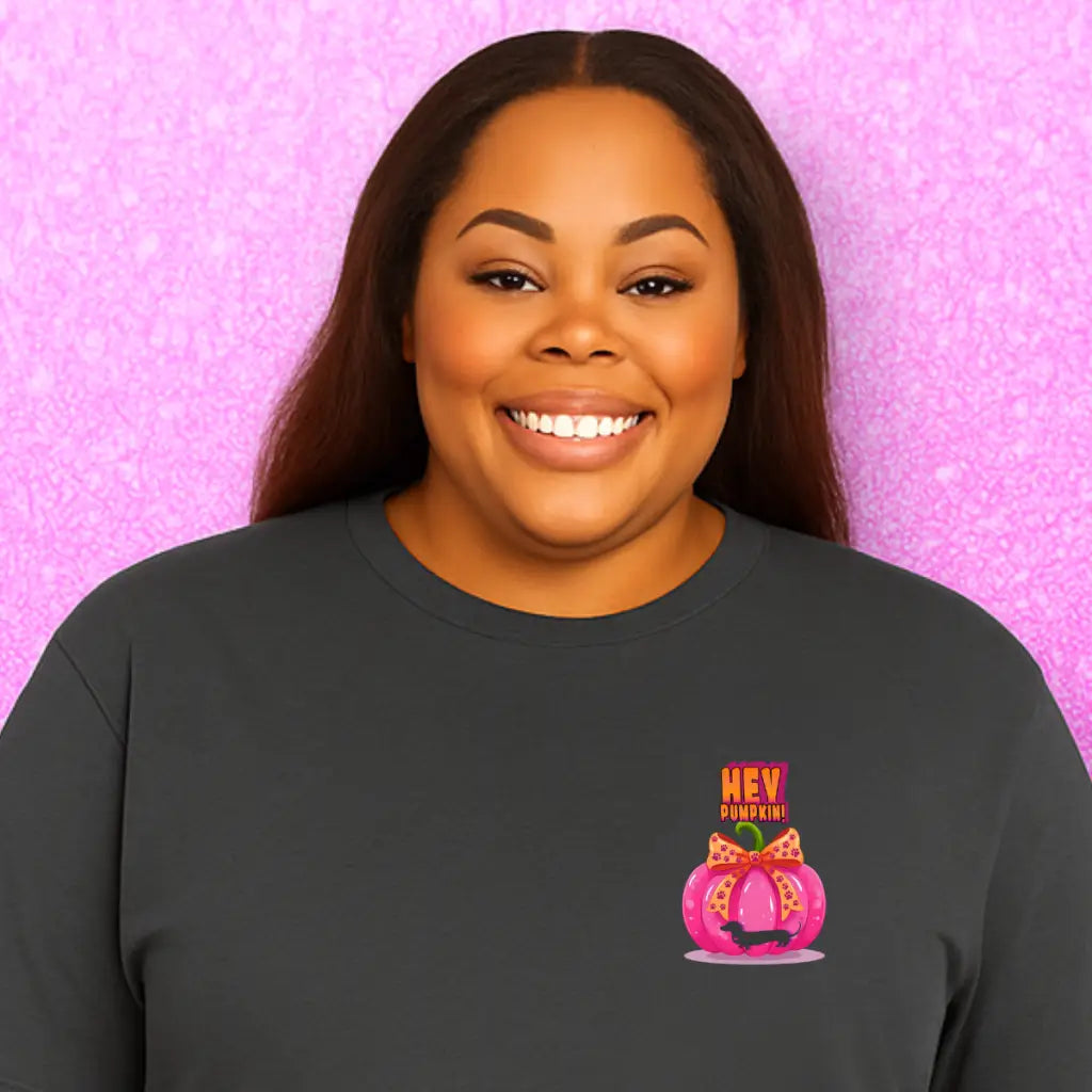 Pumpkin tee with Roxy Roo’s miniature dachshund silhouette paw print bow unisex fit and cozy comfort for fall pumpkin