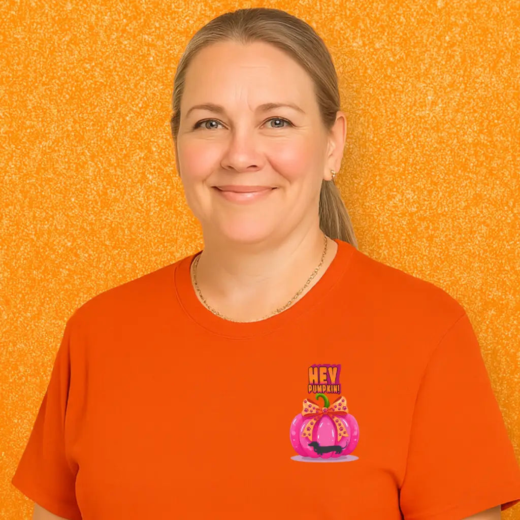 Pumpkin tee with Roxy Roo’s miniature dachshund silhouette paw print bow unisex fit and cozy comfort for fall pumpkin