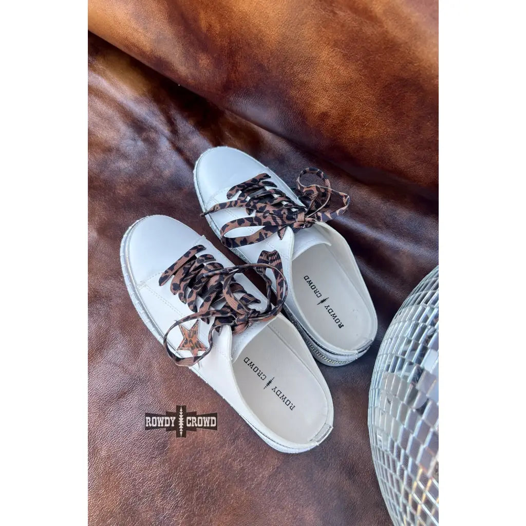 Chic slide-on tennis shoes with a leopard star and silver sparkle contrasts designed for fashionistas! True to size