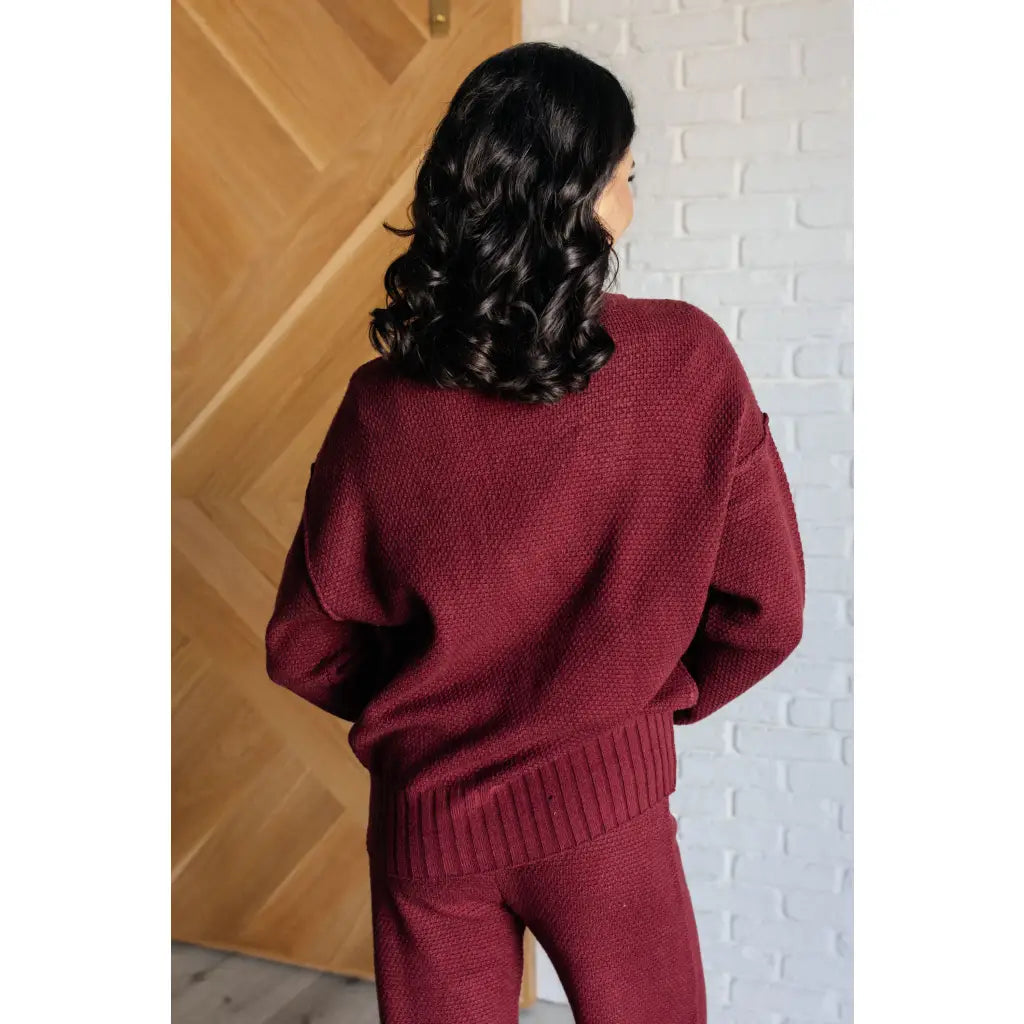 Our Simple Solution Textured Jogger Set in Wine boasts a knit v-neck sweater and high rise jogger pants. The features