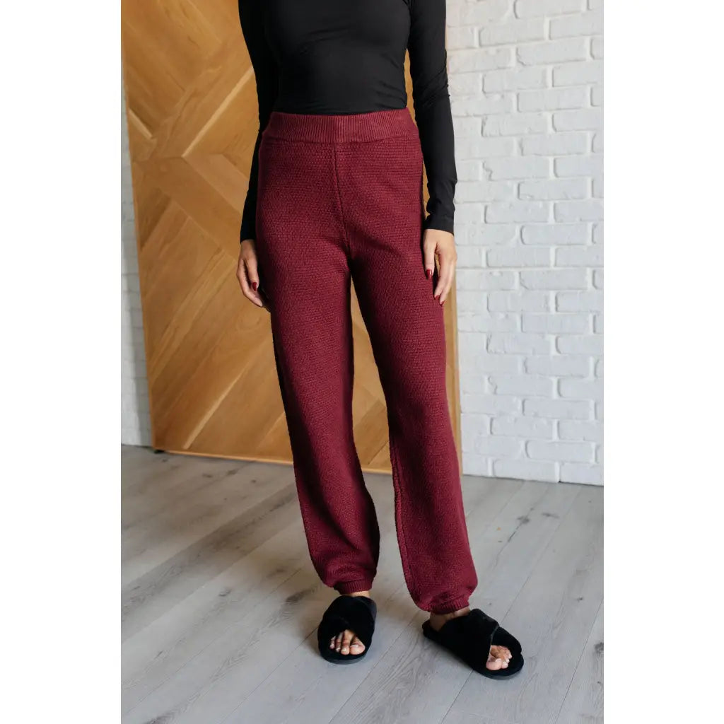 Our Simple Solution Textured Jogger Set in Wine boasts a knit v-neck sweater and high rise jogger pants. The features