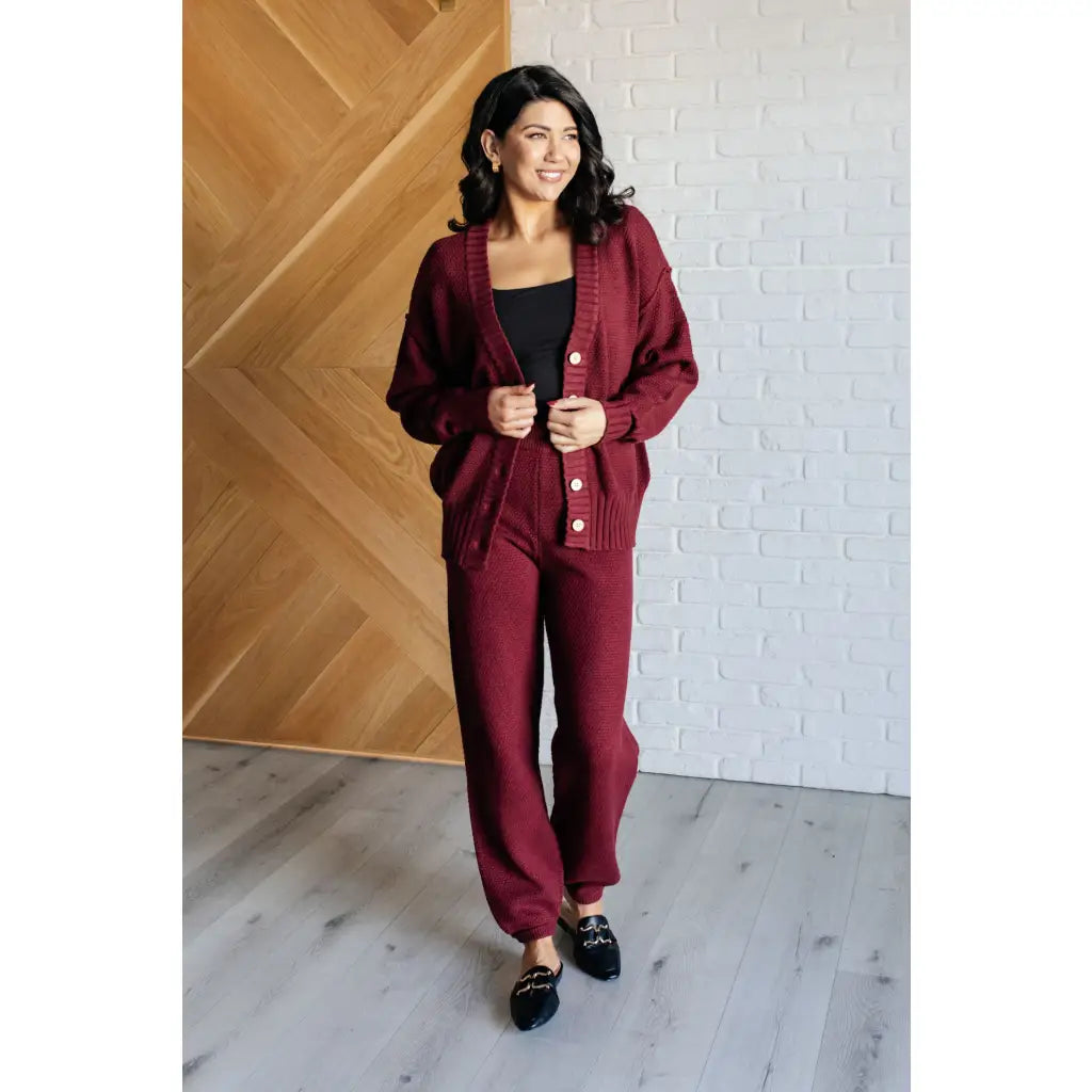 Our Simple Solution Textured Jogger Set in Wine boasts a knit v-neck sweater and high rise jogger pants. The features